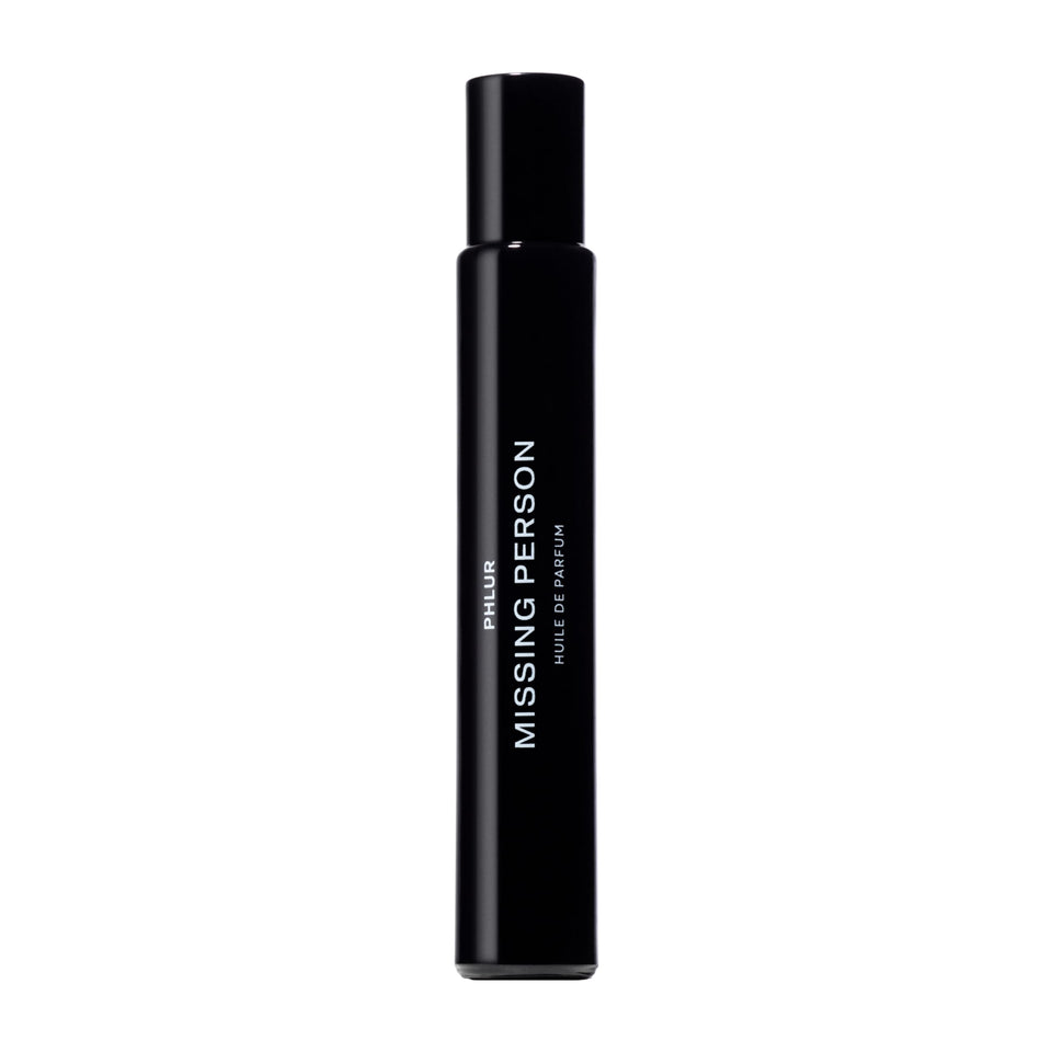 PHLUR Missing Person fragrance oil travel-size rollerball on skin for all-day wear