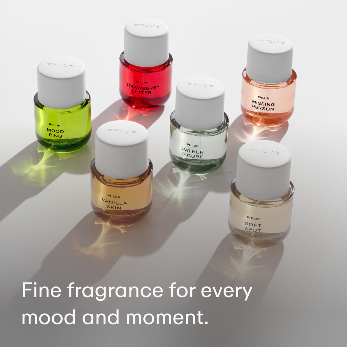 PHLUR Solar Power perfume nozzle with precise application detail