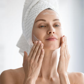 Photozyme DNA Youth Recovery Serum applied to the face for daily care