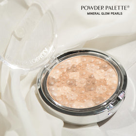 Physicians Formula compact with pearls and mirror for on-the-go glow and touch-ups.