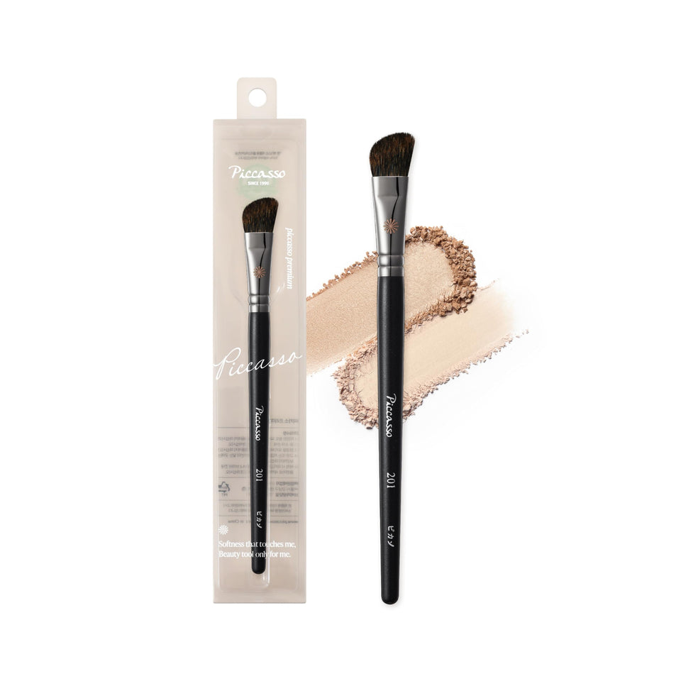 Piccasso 201 nose shading brush close-up shows precise angled tip for contouring.