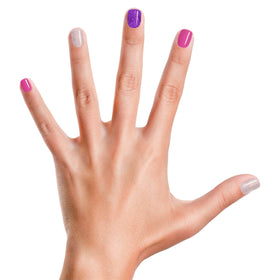 Piggy Paint Let’s Jam bright purple polish on nails for bold color