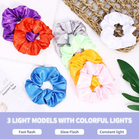 Piklodo LED hair scrunchie showing slow flash mode for subtle glow.