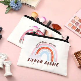 Pinkunn rainbow canvas makeup bag open, easy access to lipsticks and brushes.