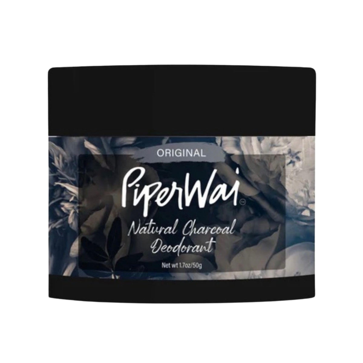 PiperWai charcoal-deodorant jar closeup shows activated charcoal for odor control.