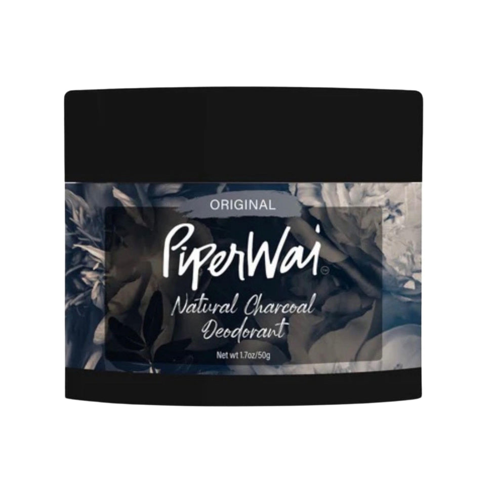 PiperWai charcoal-deodorant jar closeup shows activated charcoal for odor control.