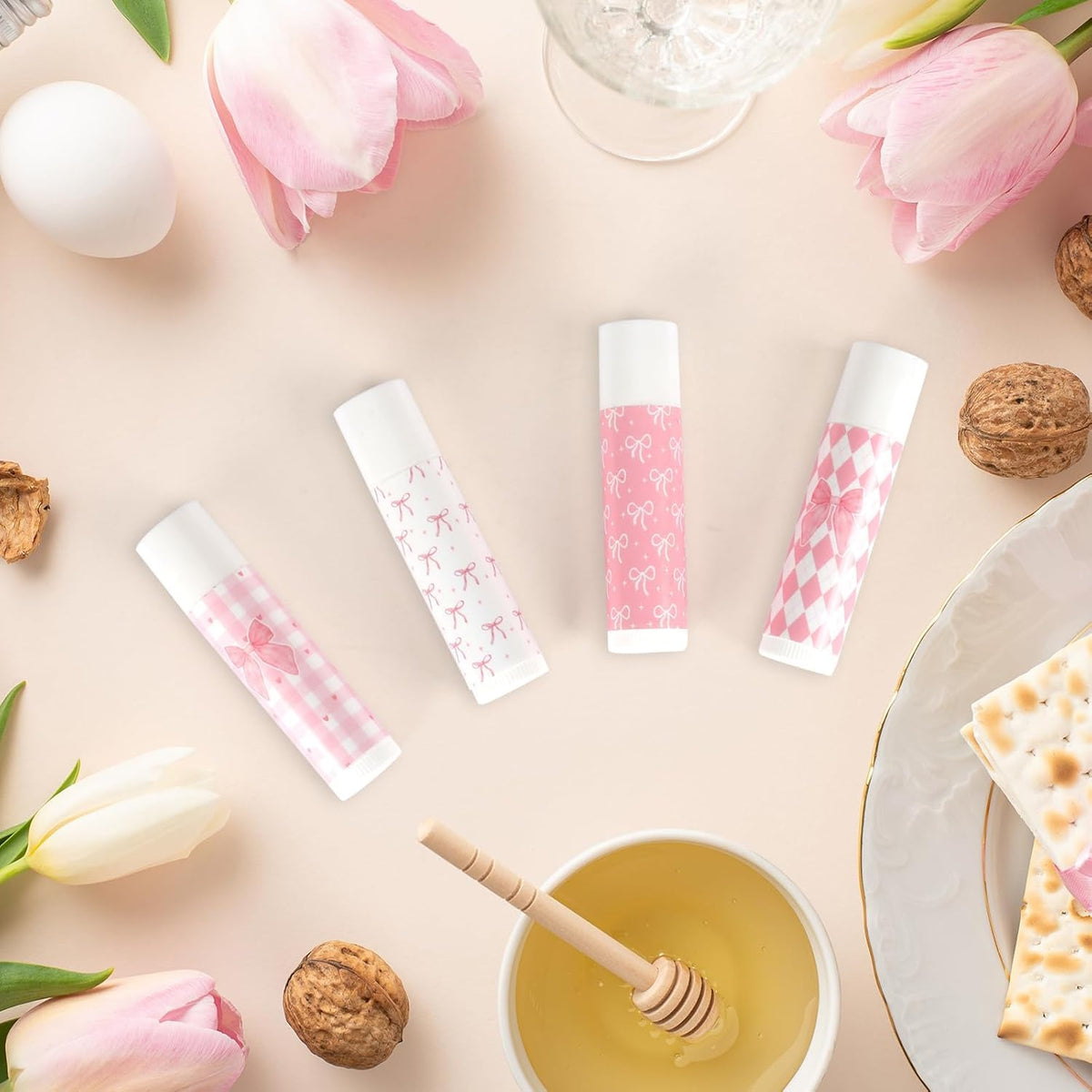 Piuaeue Pink Bow Lip Balm on table with gift-ready presentation.