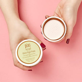 Pixi Glow Peel Pads pad closeup reveals cotton pads ready for gentle exfoliation.