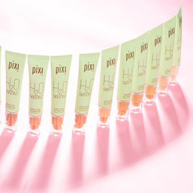 Pixi H2O SkinTint layer on skin smooths redness and evening tone.