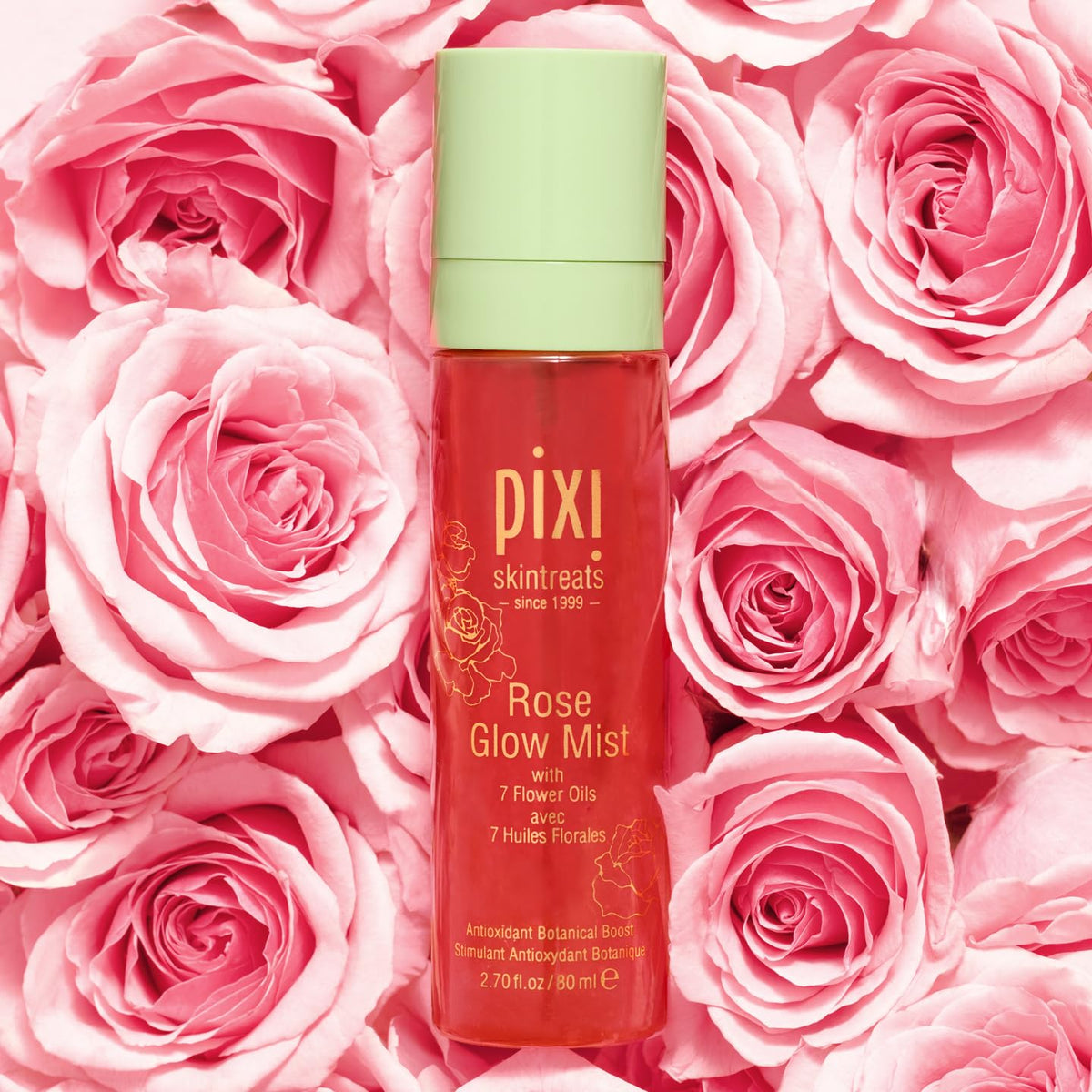 Pixi Rose Glow Mist spray on face and neck for calm hydration.
