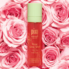 Pixi Rose Glow Mist spray on face and neck for calm hydration.