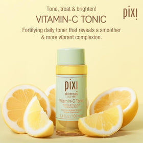 Pixi Vitamin-C Tonic being applied with a cotton round for even toning.