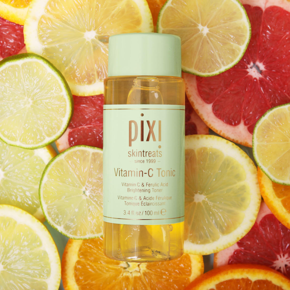 Pixi Vitamin-C Tonic glow close-up suggesting luminous, refreshed skin.