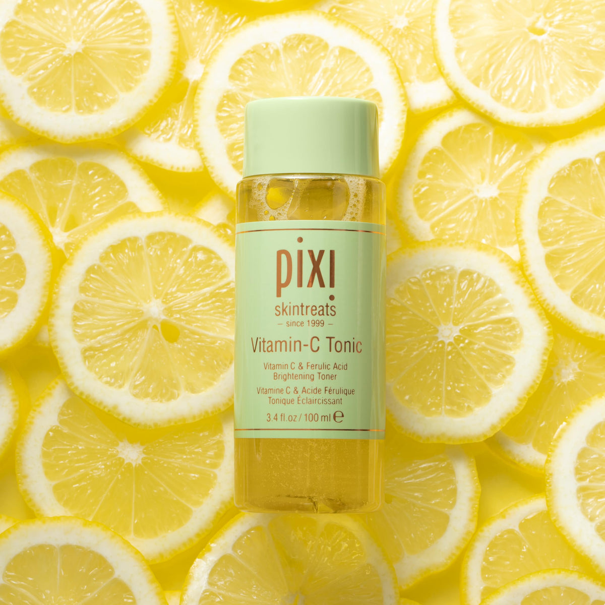 Pixi Vitamin-C Tonic with probiotics visual emphasizing skin barrier support.