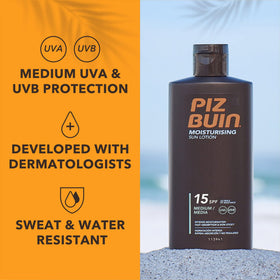 Piz Buin Moisturising Sun Lotion SPF 15 on a beach scene for sun protection