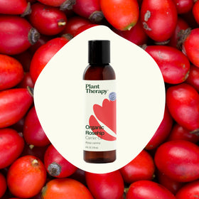 Close-up of Plant Therapy Rosehip Oil label showing organic pure quality.