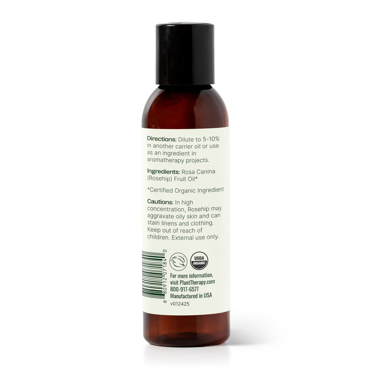 Person applying Plant Therapy Rosehip Oil to facial skin for hydration.
