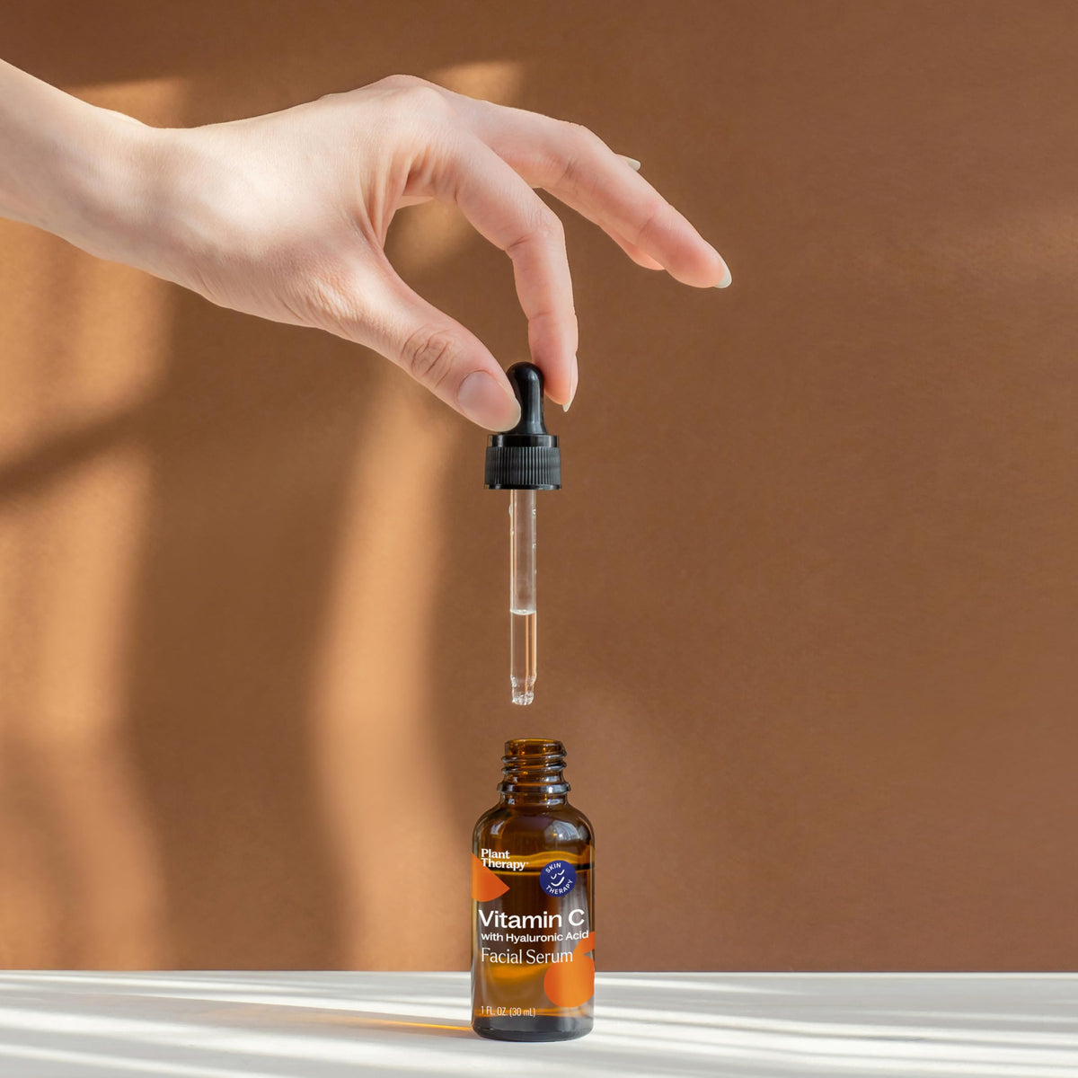 Plant Therapy Vitamin C Serum on skin aims for brightness.