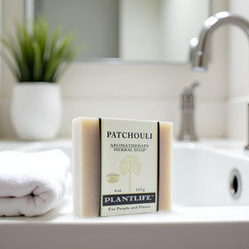 Plantlife handcrafted soap close-up showing plant-based ingredients.
