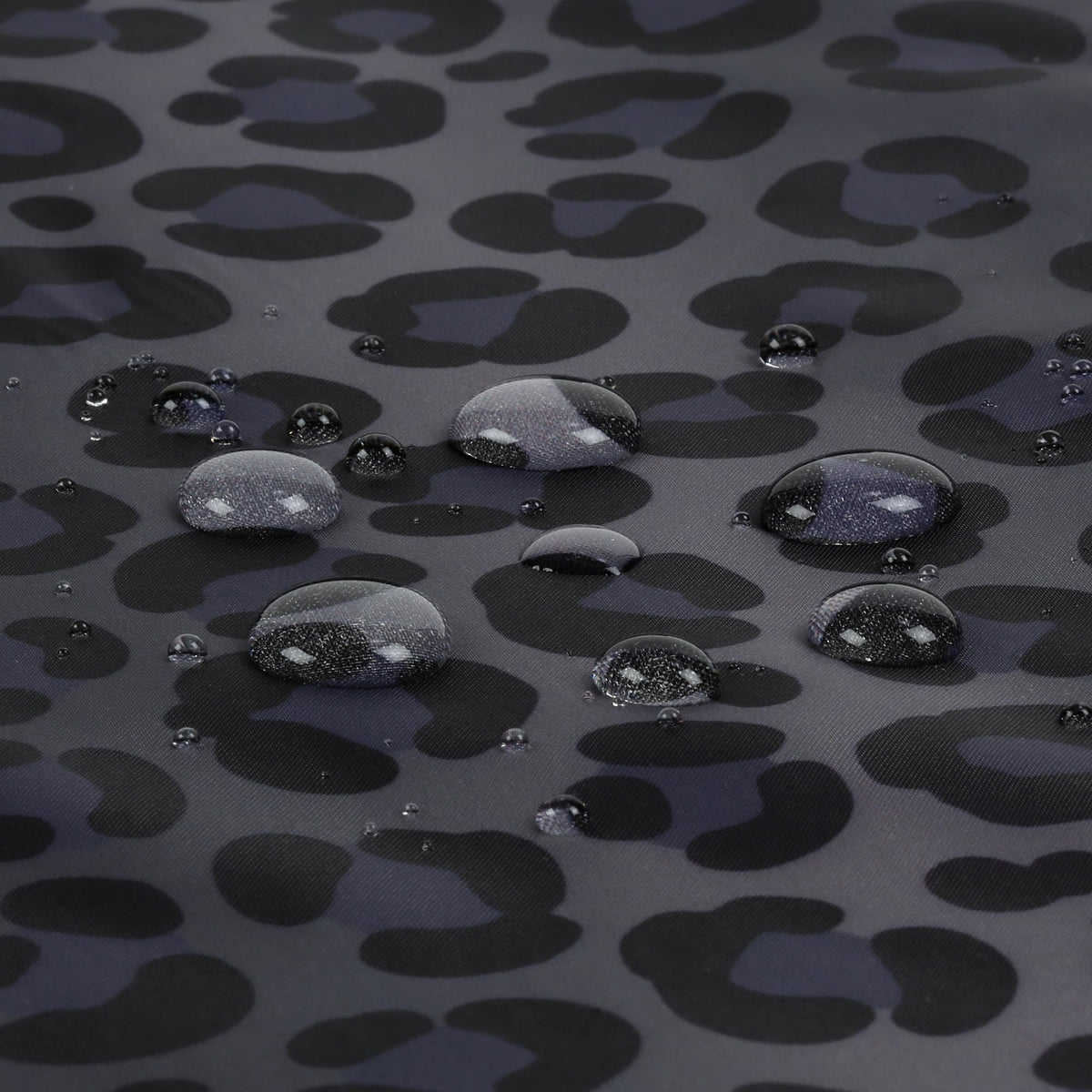 Plum Hill cape shields clients from drips during shampoo sessions