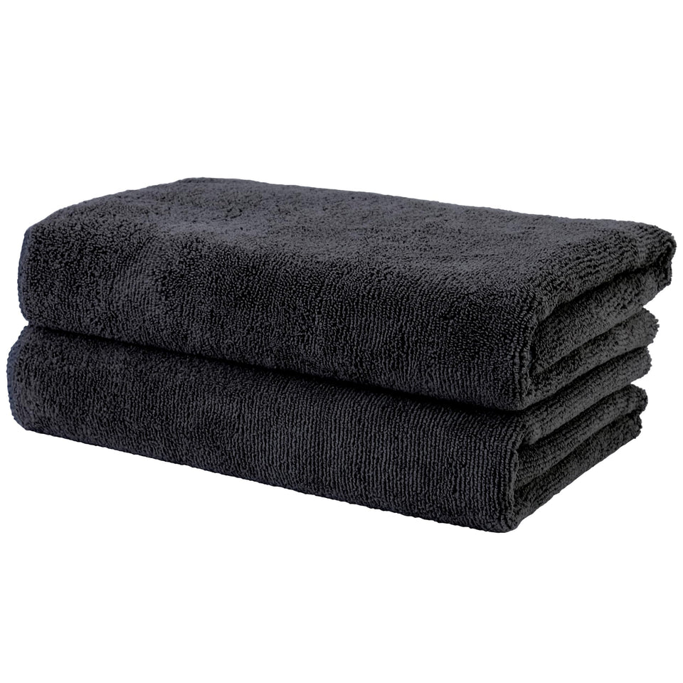 POLYTE Professional Quick Dry Towel folded for ultra-absorbent hair drying.