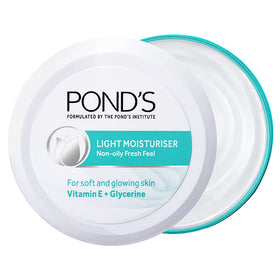 POND'S Light Moisturiser bottle pour demonstrates easy dispensing for daily hydration.
