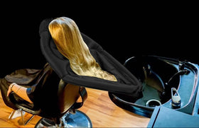 Portabelles cape used on wheelchair users for a tidy hair wash.
