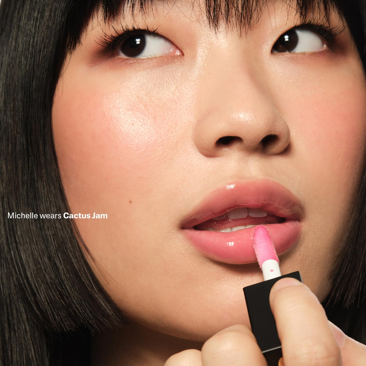 POUND CAKE Cake Theory lip-tone oil close-up emphasizes hydration and fullness