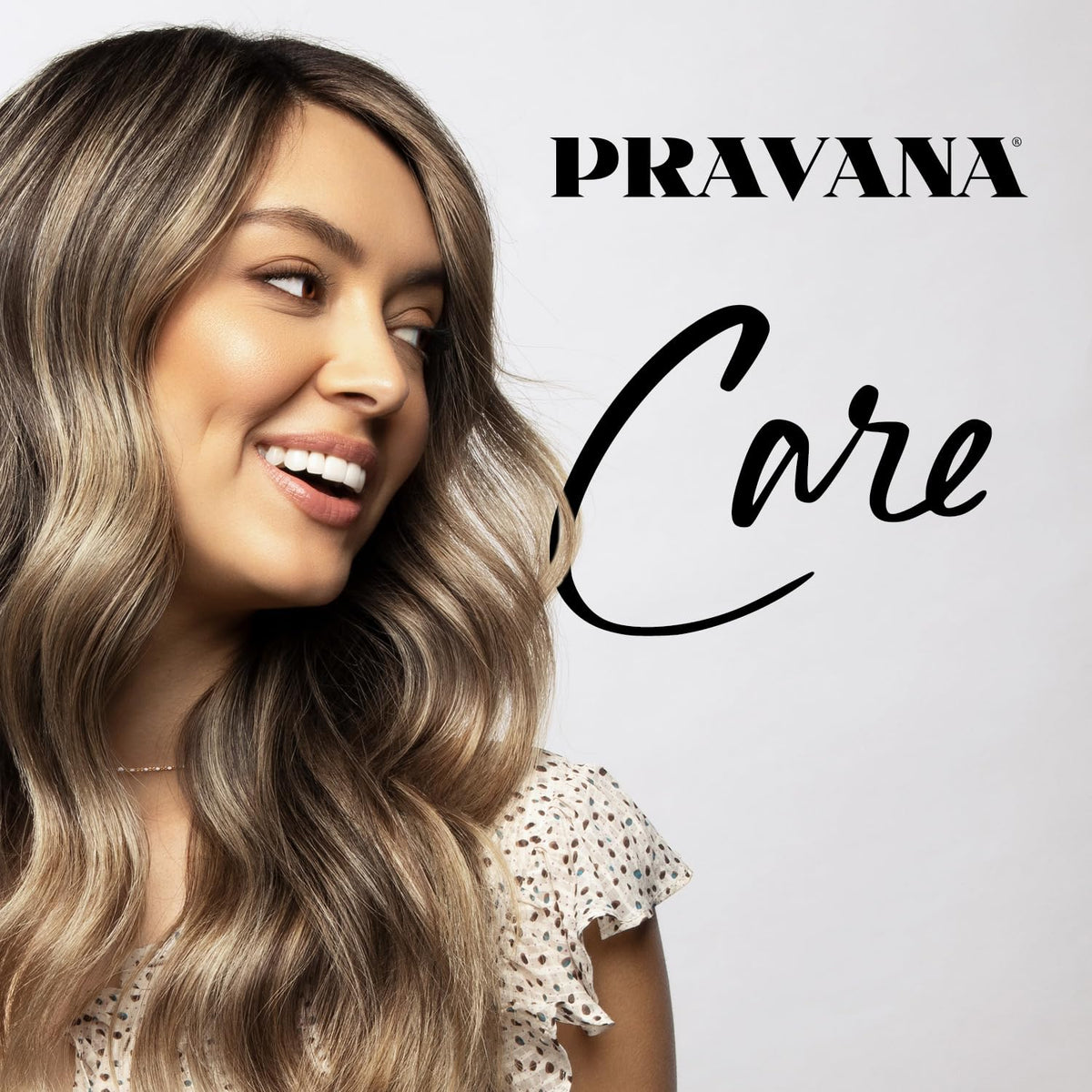 PRAVANA Purify & Revive shampoo bottle in bathroom scene with mineral removal action.