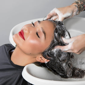 PRAVANA Purify & Revive on damp hair delivering hydration and shine.