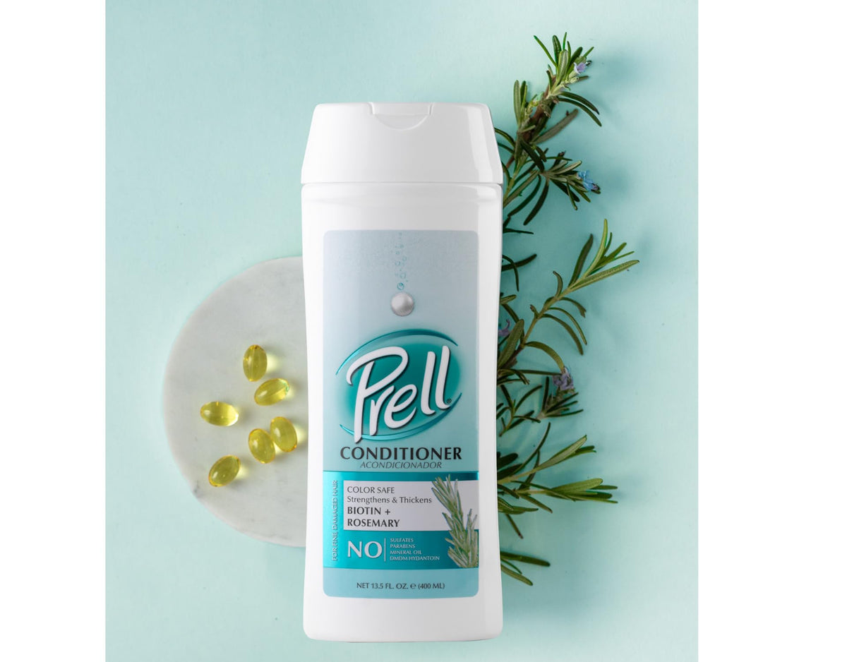 Hair strand close up looks thicker after using Prell Biotin & Rosemary