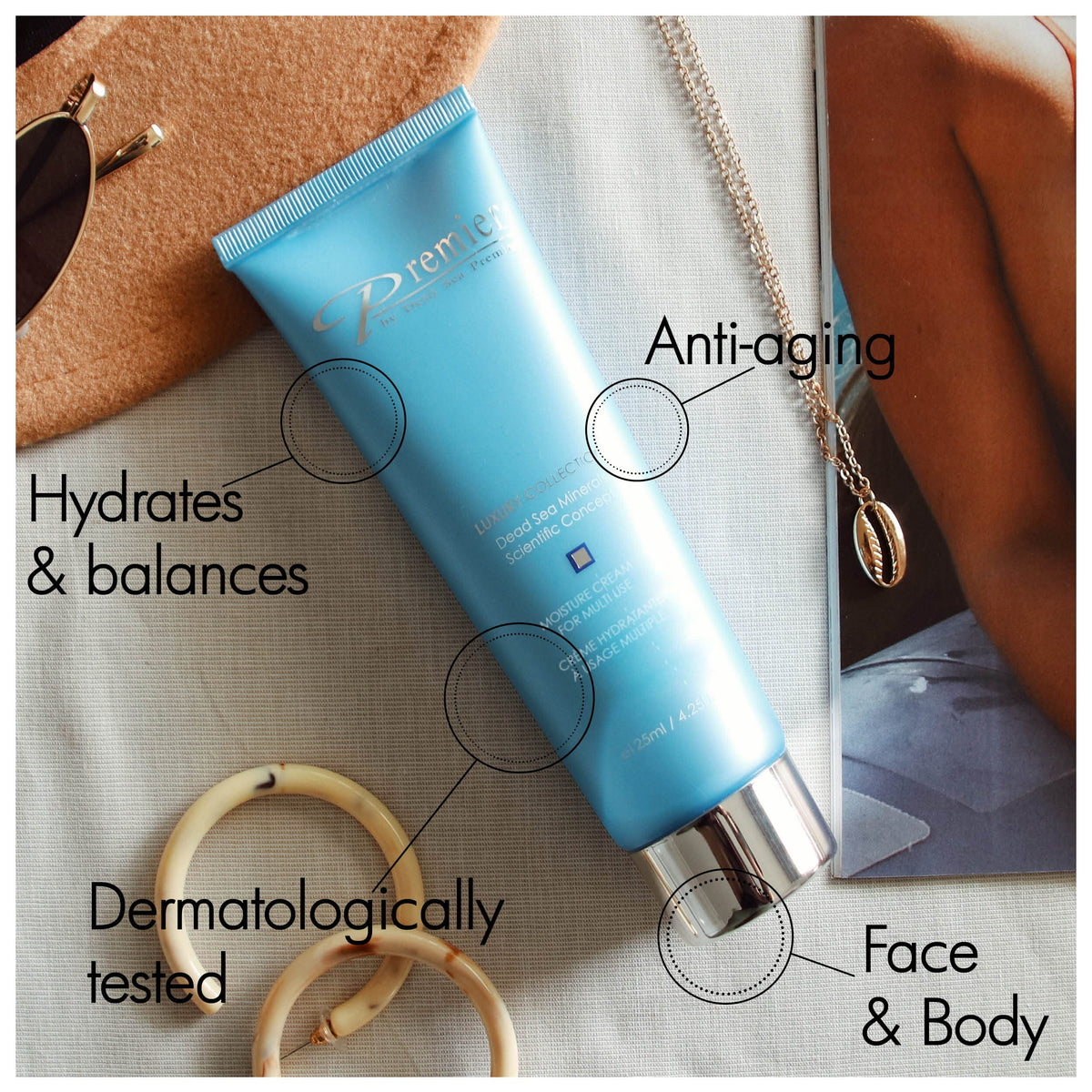 Hands applying Premier Dead Sea Moisture Cream for daily moisture.