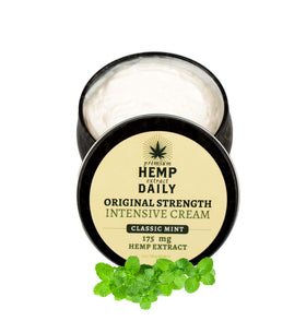 Premium Hemp Extract Daily Cream packaging in classic mint highlights vegan, organic skincare