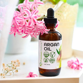 Premium Nature Argan Oil for frizz control helps manage curls naturally.