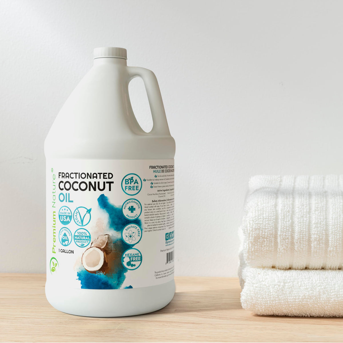 Massage-therapy application: Premium Nature fractionated coconut oil gliding smoothly on skin.