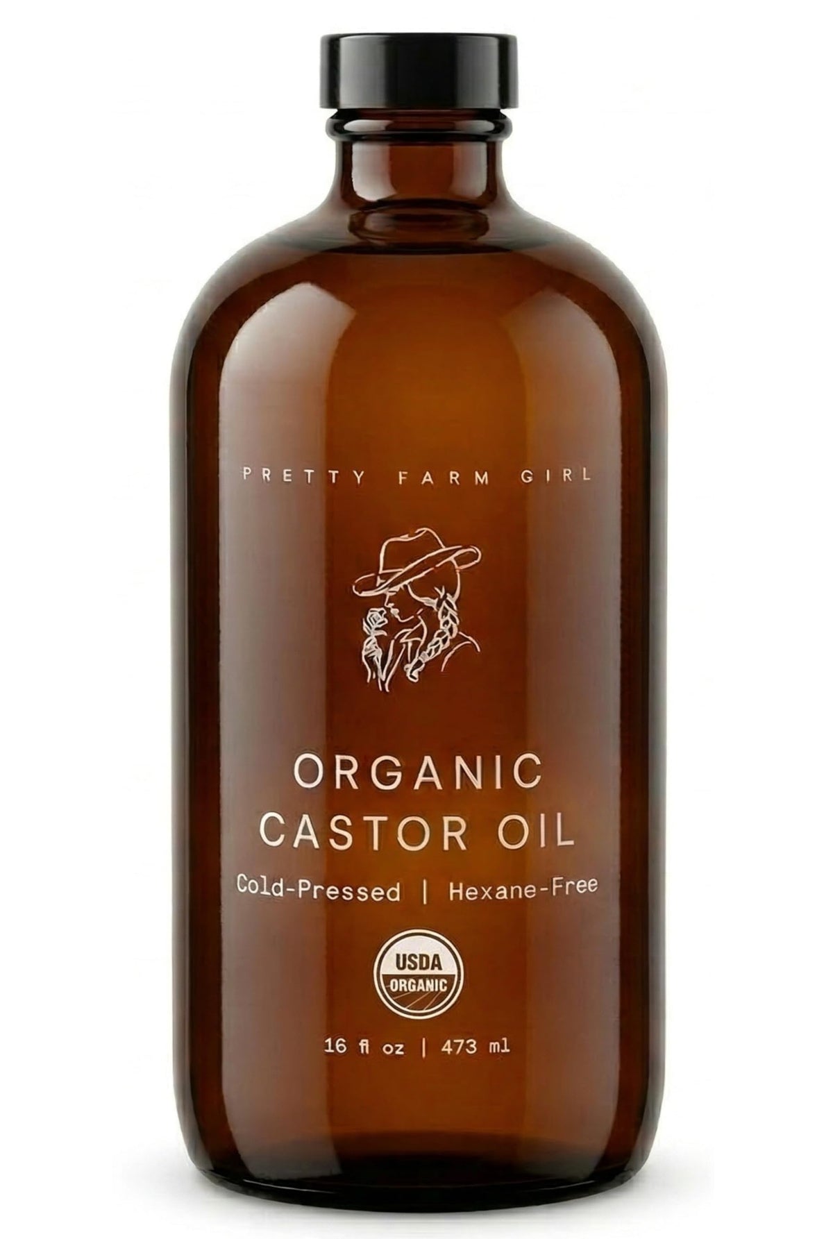 Pretty Farm Girl castor oil bottle front in amber glass preserves potency for long-lasting use.