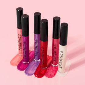 Prim and Pure Mineral Play Lip Gloss made in the USA label close-up.