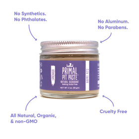 Primal Pit Paste Lavender applying a pea-sized dab for precise coverage.