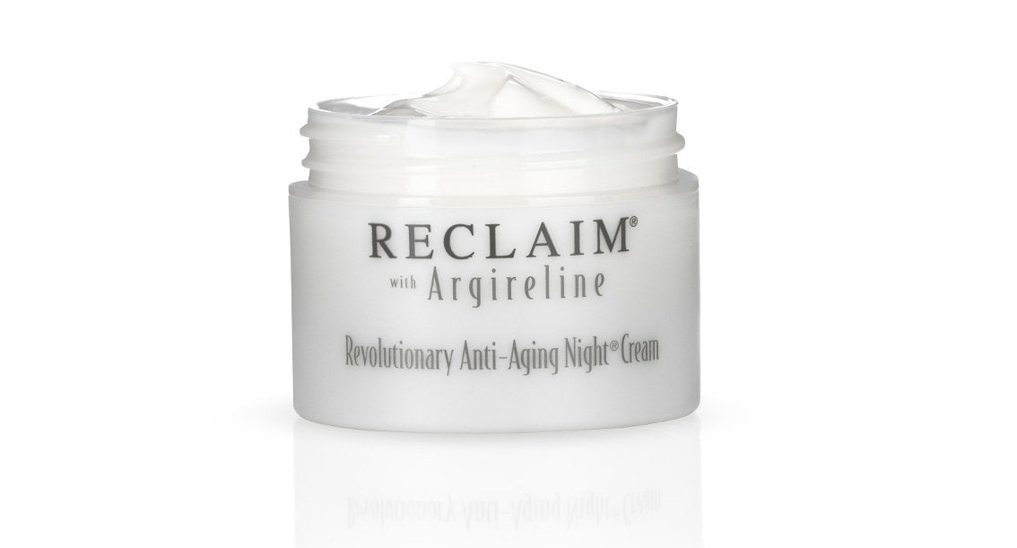 Hands applying Principal Secret Reclaim Night Cream with gentle upward motions