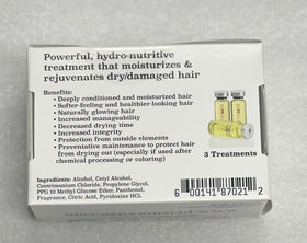 Applying Prismax Nutritivo treatment to hair strands for smoother texture