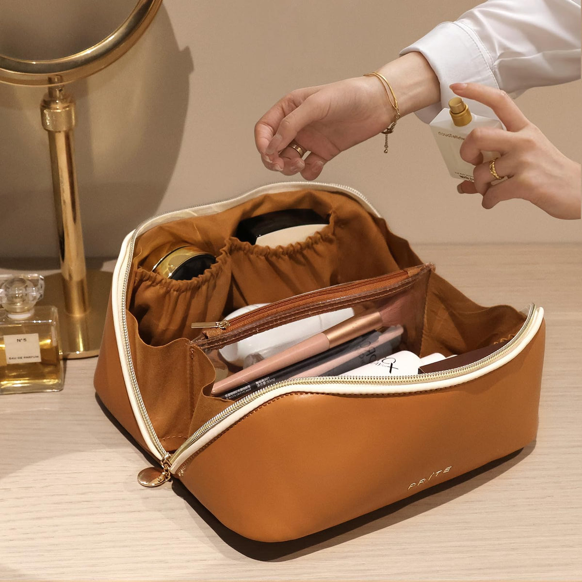 PRITE makeup bag organized compartments illustrate easy access and quick packing
