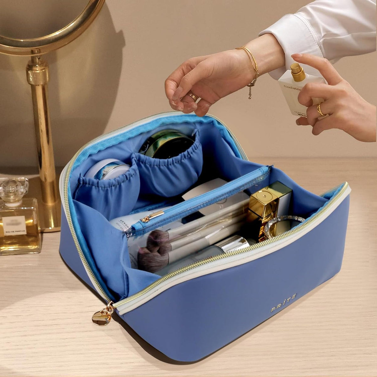 Prite blue makeup bag helps with travel organization and quick access to contents.
