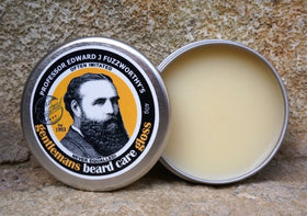 Professor Fuzzworthy's Beard Balm Gloss label closeup shows natural ingredients for healthy beard care.