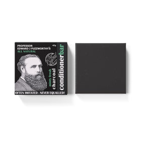 Professor Fuzzworthy's Original Detangler Bar packaging shown, a plastic-free grooming solution.