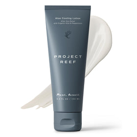 Project Reef after sun cooling lotion bottle on beach