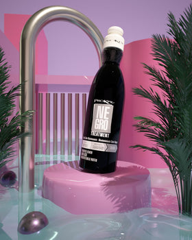 Prokpil Black Nuance bottle resting on a bathroom shelf.