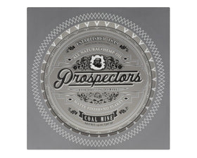 Hand applying PROSPECTORS Coal Mine Matte Clay for natural medium hold