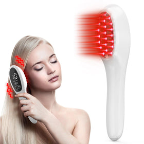PUPCA Laser Hair Growth Comb in handheld use for at-home light therapy
