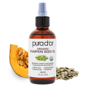 PURA D'OR pumpkin seed oil bottle on a clean surface for daily skin care.