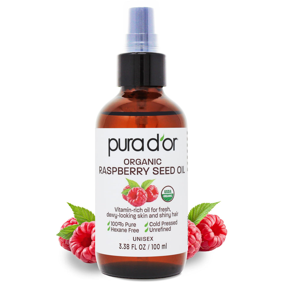 PURA D'OR Raspberry Seed Oil bottle shows organic, cold-pressed formula for hydrated skin.